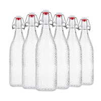 Bouteille en verre réutilisable à bouchon basculant pour la fermentation artisanale de lait, de soda, du thé et des jus, avec couvercle hermétique