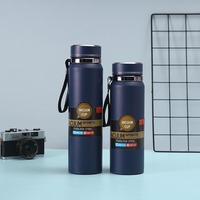 Bouteille d'eau sport grande capacité en acier inoxydable 316, tasse isotherme portable avec séparation thé/eau, design simple pour usage extérieur