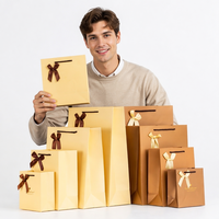 Sacs cadeaux en papier couché personnalisés avec poignées et nœuds en ruban pour le shopping et l'emballage – Offre Spéciale