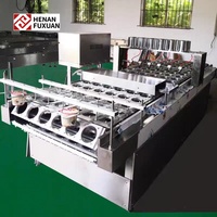 Machine de remplissage et de scellage entièrement automatique pour boissons, destinée aux cartons avec emballage en bois