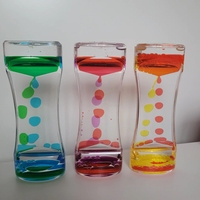 Nouveau liquide minuterie jouets sensoriels liquide mouvement barboteur minuterie flottant couleur lave lampe fidget jouets