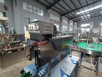 Machine manuelle de rétrécissement de bouteilles de vin d'huile d'olive en verre semi-automatique de capsule de pvc