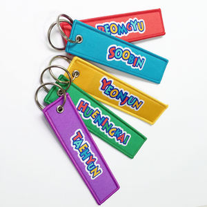 En gros Logo <span class=keywords><strong>Personnalisé</strong></span> Vol Brodé <span class=keywords><strong>Porte</strong></span>-clés <span class=keywords><strong>Porte</strong></span>-clés Supprimer Vol Avant Vol Tissé Logo Étiquette Personnalisée - Product Image 1