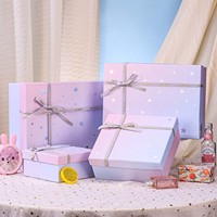 Vente en gros de boîtes cadeaux rigides tendance pour bougies et cosmétiques, design rectangulaire avec nœud, matériaux recyclés, logo personnalisé