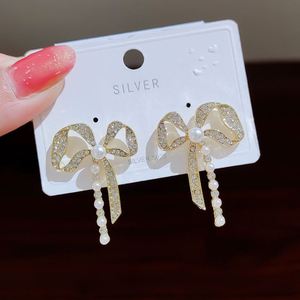 Wholesale Women Japanese and Korean Sweet Net <b>Red</b> Bow Pearl Diamonds Gold Plated <b>Earrings</b> - Product Image 1