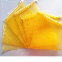 Sacs en filet mono-maille HDPE avec cordon de serrage pour l'emballage des légumes, des fruits, des oignons, des pommes de terre, de l'ail et des pommes