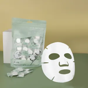 Sıkıştır özel yüz maskeleri cilt bakımı aracı tek kullanımlık sıkıştırılmış retiküle Tencel yüz maskesi tam viskon makyaj maskesi