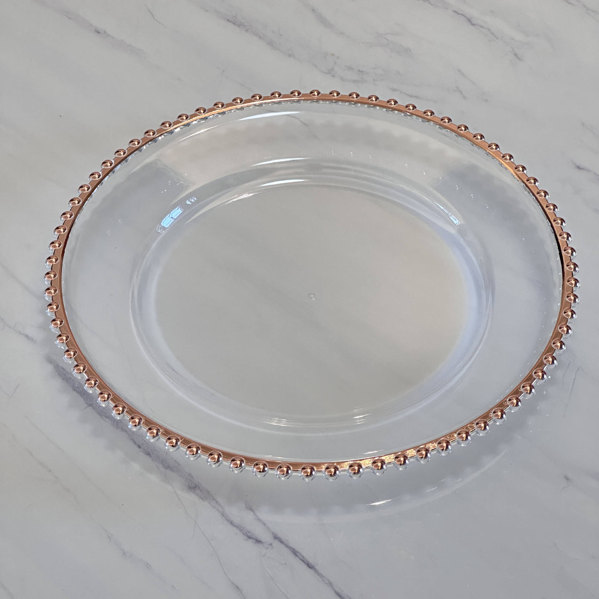 Transparent avec des perles en or rose