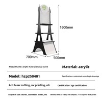Anpassbarer Eiffelturm-Acryl-Make-up-Displayständer Umweltfreundliches Bodenregal für Parfüm-Kosmetik-Einzelhandelsgeschäft-Promotion