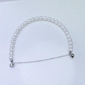 สร้อยข้อมือไข่มุกน้ำจืดออโรร่า บริสุทธิ์ ขนาด 5-6 มม. ทรงกลม แทบไร้ตำหนิ ความยาวตามขนาดมือ มีตัวเลือกแบบติดตั้งด้วยแม่เหล็ก - Product Image 3