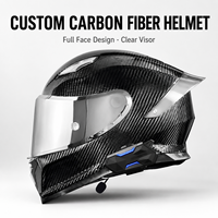 Casque de moto intégral personnalisé OEM avec coque en fibre de carbone brillante, visière transparente et module de communication
