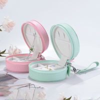 Étui à bijoux de voyage rond à fermeture éclair Organisateur de rangement en cuir PU fait à la main pour objets de valeur