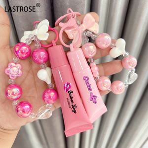 Bonito tubo exprimidor de plástico rosa para brillo de labios Esencia de labios <span class=keywords><strong>Lipoil</strong></span> contenedor vacío con llavero embalaje cosmético para forma líquida - Product Image 4