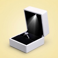 Boîte à bijoux de luxe pour collier, boucles d'oreilles, bracelet, emballage de bijoux pour petites entreprises avec lumière LED