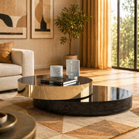 Table basse ronde moderne de luxe rotative avec plateau en marbre noir brillant et structure en acier inoxydable doré pour salon