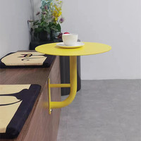 Table murale en fer au design jaune tendance pour salon de thé, café, boulangerie, pâtisserie, petite table