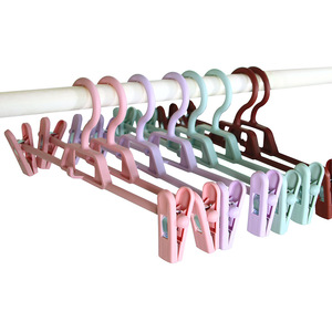 Factory Wholesale Wholesale Plastic Retractable Adjustable Pants Hanger Color Dry Clothes Without Trace Hanger With Clips