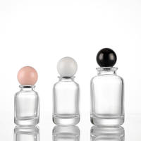 30ML 50ML 100ML Botellas de perfume de vidrio redondas multiespecificación con 15 tapas de bayoneta empaquetadas en tapas de bola de madera de colores