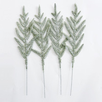 Vente chaude nouveau modèle accessoires de décoration de guirlande de noël à la main branche d'aiguille de pin artificiel doux floqué doux