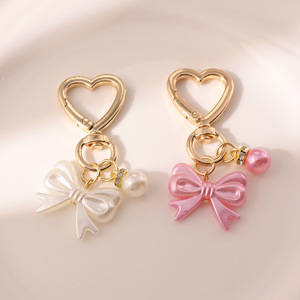 AM Fris en zoet strikje parel gouden deurknop sleutelhanger hanger schattig hoofdtelefoon etui tas hangend ornament - Product Image 2