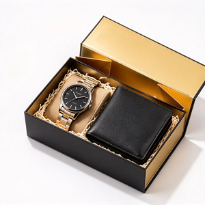 Boîte cadeau magnétique de luxe en carton rigide noir et or avec ruban satiné, finition élégante en feuille métallisée pour cosmétiques - Product Image 1