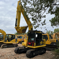 Vente Flash : Excavatrice sur chenilles Komatsu 130 d'occasion, 13 tonnes, système hydraulique complet, bon état, livraison rapide, expédition mondiale