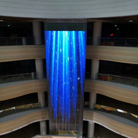 Panneau d'affichage à LED en verre super clair Affichage de signalisation LED transparent haute luminosité pour mur vidéo publicitaire dans le hall de l'ascenseur