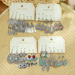 Pendientes de aleación de joyería de moda, estilo bohemio, diseño de plumas para mujer, para fiestas. - Product Image 1