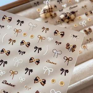 Nuevas pegatinas de uñas con botones y lazos en relieve para otoño e invierno, decoraciones adhesivas traseras explosivas estilo Maillard. - Product Image 3