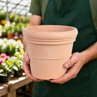 Pots en plastique ronds robustes empilables anti-UV en PP finition mate terre cuite durables pour jardin et pépinière avec drainage