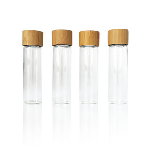 Emballage en tube cylindrique à l'épreuve des enfants, capsule hermétique en verre, pilule, médicament, poudre, <span class=keywords><strong>pot</strong></span> en verre avec bouchon en bambou résistant aux enfants - Product Image 1