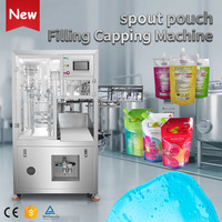 Machine de remplissage et de bouchage automatique de sachets préformés à bec verseur pour liquides visqueux, détergents et produits de lessive (type Doypack)