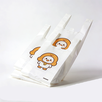 30 pièces/rouleaux Sacs en plastique imprimés avec le logo Tang Jin, biodégradables, surface souriante, sacs pour t-shirts et sacs d'emballage
