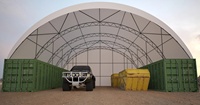 Hangar de stockage préfabriqué robuste de 65x40 pieds, servant de chapiteau industriel haute résistance offrant un espace de stockage massif
