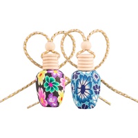 Bouteilles de parfum suspendues pour voiture en gros, 15 ml, en céramique douce, surface lisse, diffuseur d'aromathérapie avec couvercle en bois