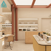 Vitrine de présentation de parfums avec éclairage LED, design luxueux et moderne, comptoir personnalisé, mobilier pour boutique de parfums