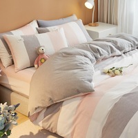 Ensemble minimaliste japonais de quatre pièces housse de couette simple en coton lavé drap de lit pour la maison
