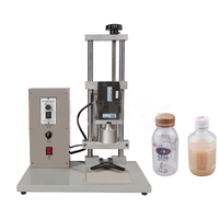 Mini machine de capsulage semi-automatique en acier inoxydable avec volant de réglage en hauteur, conception à haute efficacité d'étanchéité, prix de gros