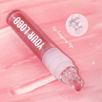 OEM Custom Plumping Lip Oil Gel met Lip Hugging Tip, 24 uur hydraterende glanzende glazen glans, transparante vloeibare lipgloss, fabriek