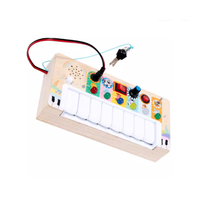 Jouet musical en bois pour enfants avec clavier de piano et effets sonores d'animaux, planche d'activités multifonctionnelle sensorielle pour développer la motricité fine