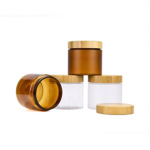 Tarro cosmético de plástico PET transparente con logotipo grabado, para exfoliante de azúcar y crema corporal, con tapa de bambú de rosca, para suero y loción para el cuidado de la piel. - Product Image 1
