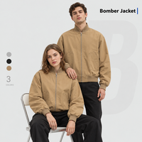 Blouson Bomber Unisexe Hydrofuge Col Montant Fermeture Éclair Manches et Ourlet Côtelés Coupe Ample Vêtement d'Extérieur Décontracté Vente en Gros