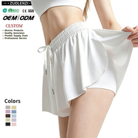Jupe-short fluide blanche personnalisée avec short cycliste intégré en Spandex respirant et anti-transpiration 2-en-1 pour femme – Idéale pour la gym, le yoga et la course à pied