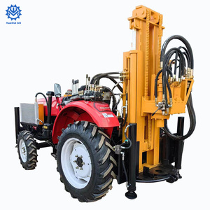 Foreuse hydraulique jaune montée sur tracteur rouge pour le forage de puits d'eau - Product Image 2