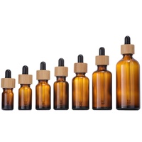 Grosir botol minyak esensial kaca Amber dengan tutup penetes bambu 5ml 10ml 30ml 50ml 100ml ukuran kosong untuk pembelian jumlah besar