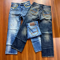 Jeans de Hombre Estilo Coreano Vintage 2026, Cintura Media, Mezclilla Ecológica con Diseños de Agujeros, ODM