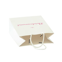 Sac en papier personnalisé avec logo imprimé YH Wholesale pour l'emballage de cosmétiques, de vêtements et de bijoux, avec différentes poignées