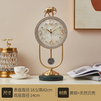 Horloge de table éléphant en laiton de luxe léger, populaire sur TikTok, cadran coloré, silencieuse, à piles, décoration d'intérieur, best-seller