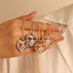 Collier en acier inoxydable plaqué or personnalisable avec gravure laser, nœud d'amour, double cœur, cadeau idéal pour la vente en gros - Product Image 1