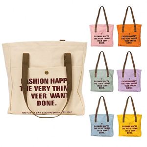 Sac fourre-tout en toile crème avec poche avant, bouton-pression et impression de slogan pour étudiants, courses quotidiennes et travail - Product Image 2
